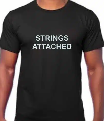 FUNNY GUITAR STRINGS T SHIRT. Image of Black t shirt with slogan in white printed on frony "STRINGS ATTACHED"